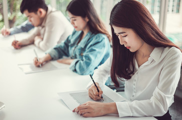 Selective focus Student filling out answers to a test with a pencil.