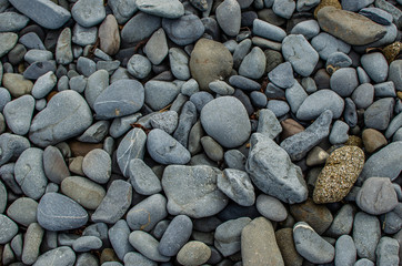 Background photograph of some stones of a Menorca beach.
