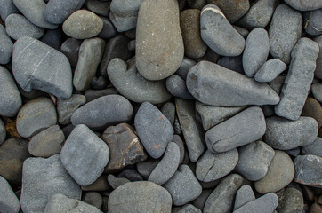 Fototapeta na wymiar Background photograph of some stones of a Menorca beach.