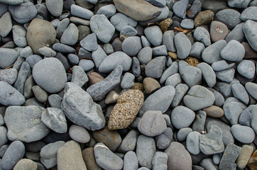 Background photograph of some stones of a Menorca beach.