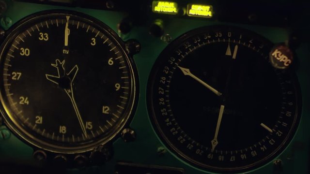 Close up shot of working heading and non-directional radio beacon indicators on instrument panel on aircraft