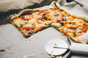 Homemade pizza. Products from puff pastry. Cooking yourself. Healthy food. Vegetables, cheese, greens, chicken. Dough. Process of making pizza.