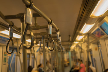 Metropolis handrails in the electric train. Handle sky train, Handles for standing passenger in electric train.