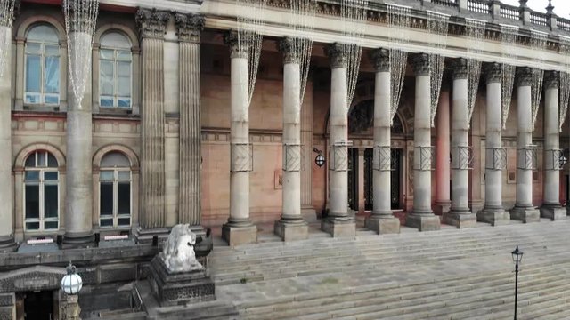 Leeds City Center Town Hall Aerial 4k footage going upon the side of the Town Hall showing the Whole of the Leeds City Center in West Yorkshire