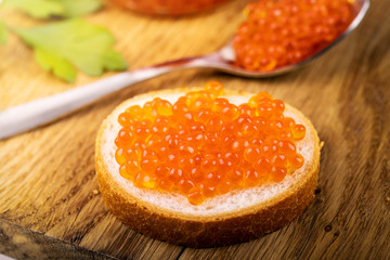 caviar snacks - red fish roe on the bread