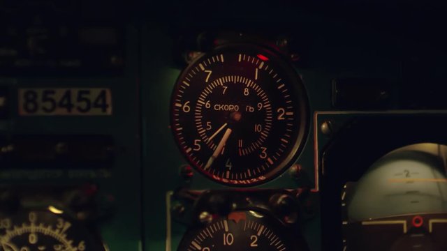Close up shot of working airspeed indicator on instrument panel of airplane