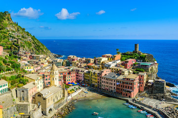 Vernazza - Village of Cinque Terre National Park at Coast of Italy. Beautiful colors at sunset. Province of La Spezia, Liguria, in the north of Italy - Travel destination and attractions in Europe.