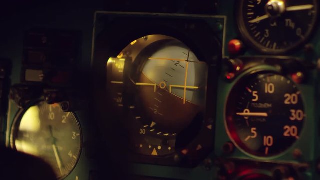 Close up shot of working altitude and vertical speed indicators on instrument panel of aircraft