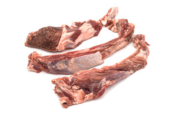 Raw ribs with meat on a white background