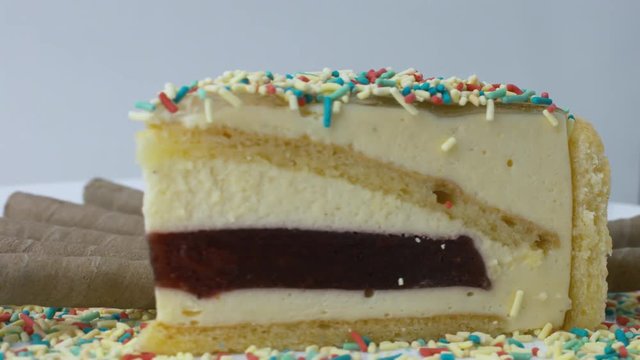 Cake With Sprinkles Dessert Spinning Right to Left Close Up