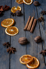 Fototapeta na wymiar cinnamon sticks and star anise on wooden background