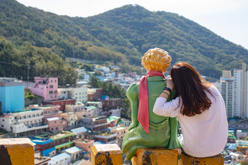 Fototapeta na wymiar Busan, South Korea - October 11, 2018 - Gamcheon Culture Village is the famous attractive spot for tourists. It is colourful village on mountain slope always used to film Korean TV series. 