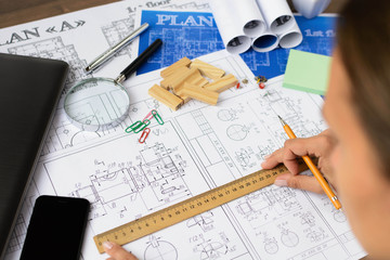 Architectural blueprints - drawings, pencil, calculator, calculations, plan, ruler, computer. Business and science. 