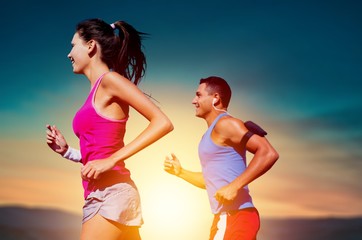 Fitness, sport, friendship and lifestyle concept - smiling