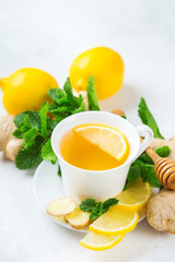 Ginger tea in a cup for flu cold winter days