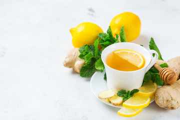 Ginger tea in a cup for flu cold winter days