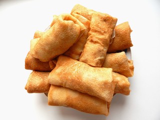 Pancakes with filling inside will decorate the recipe and perfectly complement any culinary site. Homemade pancakes can be with cottage cheese, meat or jam.