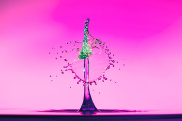 abstract background of splash of color water, collision of colored drops, the concept art