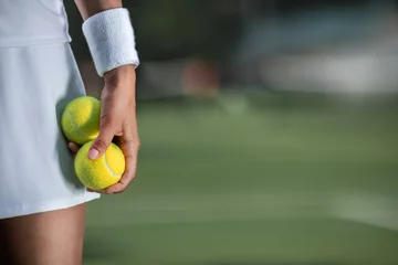Deurstickers Tennis player in sportswear close-up © AboutLife