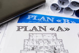 Architectural blueprints - drawings, pencil, calculator, calculations, plan, ruler, computer. Business and science. 