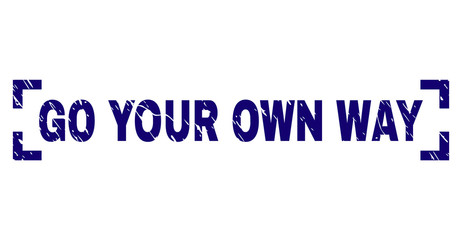 GO YOUR OWN WAY title seal stamp with corroded texture. Text title is placed between corners. Blue vector rubber print of GO YOUR OWN WAY with retro texture.