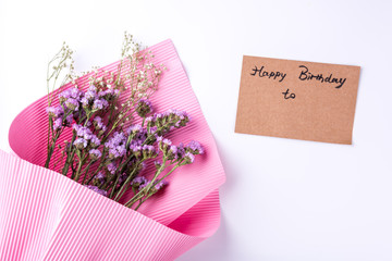Flowers and Card Happy birthday. Sea lavender and baby`s breath Gypsophila flowers