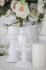 Wedding bouquet of white roses in a vase. Wedding decorations. White Rose.