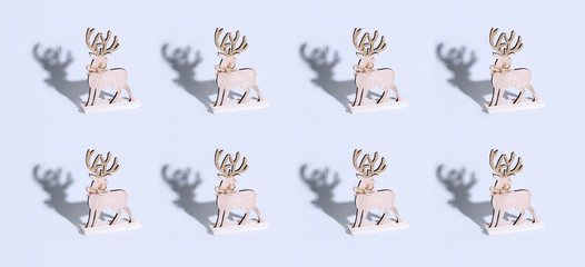 Cute reindeer chrismas decoration on bright background.