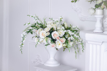 Wedding bouquet of white roses in a vase. Wedding decorations. White Rose.