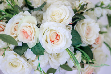 Fototapeta na wymiar Wedding bouquet of white roses in a vase. Wedding decorations. White Rose.
