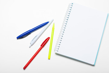 notepad notebook and ball pont pen isolated on white background