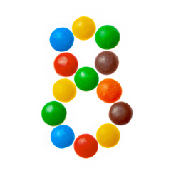 Number 8 eight of sweet colored candies, alphabet isolated on white background