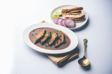 Patodi Rassa Bhaji or patwadi Sabji, a popular Maharashtrian spicy recipe served with Chapati and salad. Selective focus