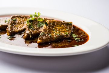 Patodi Rassa Bhaji or patwadi Sabji, a popular Maharashtrian spicy recipe served with Chapati and salad. Selective focus