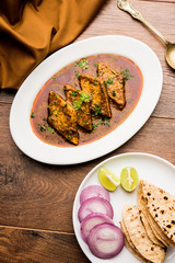 Patodi Rassa Bhaji or patwadi Sabji, a popular Maharashtrian spicy recipe served with Chapati and salad. Selective focus