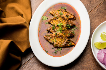 Patodi Rassa Bhaji or patwadi Sabji, a popular Maharashtrian spicy recipe served with Chapati and salad. Selective focus