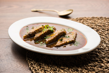 Patodi Rassa Bhaji or patwadi Sabji, a popular Maharashtrian spicy recipe served with Chapati and salad. Selective focus