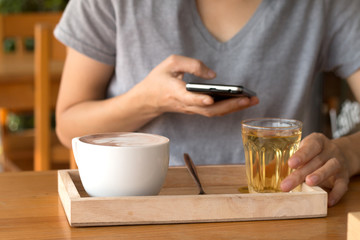 Woman enjoying warming drink, Late coffee in a cup