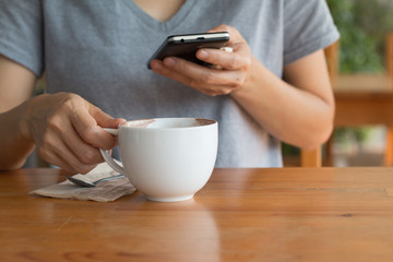 Woman enjoying warming drink, Late coffee in a cup
