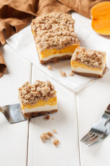 Portion of layered creamy pumpkin cake