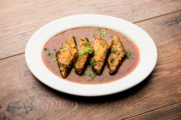 Patodi Rassa Bhaji or patwadi Sabji, a popular Maharashtrian spicy recipe served with Chapati and salad. Selective focus