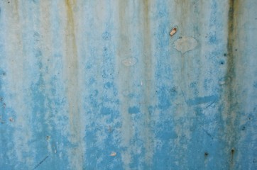 rust on old blue wall background