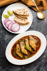 Patodi Rassa Bhaji or patwadi Sabji, a popular Maharashtrian spicy recipe served with Chapati and salad. Selective focus