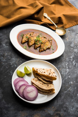 Patodi Rassa Bhaji or patwadi Sabji, a popular Maharashtrian spicy recipe served with Chapati and salad. Selective focus