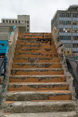 Damaged stairs and wall