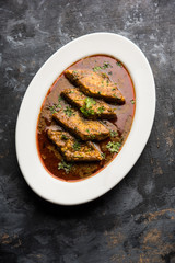 Patodi Rassa Bhaji or patwadi Sabji, a popular Maharashtrian spicy recipe served with Chapati and salad. Selective focus