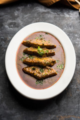 Patodi Rassa Bhaji or patwadi Sabji, a popular Maharashtrian spicy recipe served with Chapati and salad. Selective focus