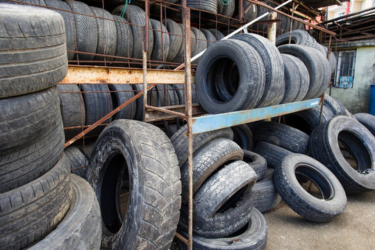 Car old used tires close up. Pile of used tires
