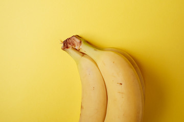 Banana fruit on yellow background isolated