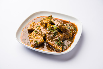Patodi Rassa Bhaji or patwadi Sabji, a popular Maharashtrian spicy recipe served with Chapati and salad. Selective focus